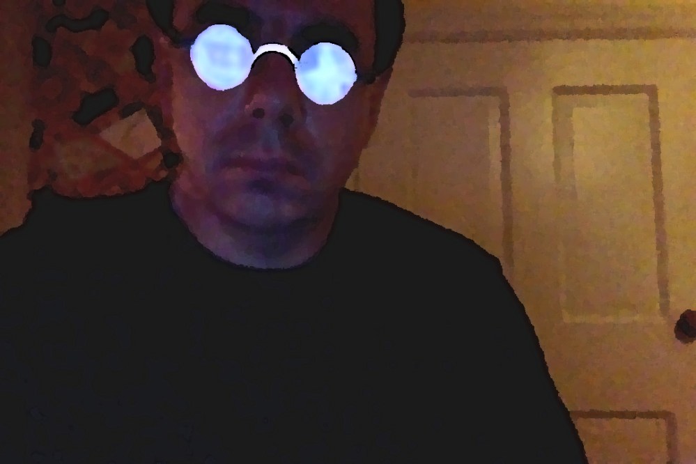 Computer Screen reflecting off my glasses, causing a glow.