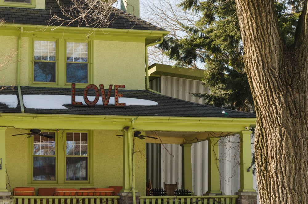 Love, in lights, with snow in the background
