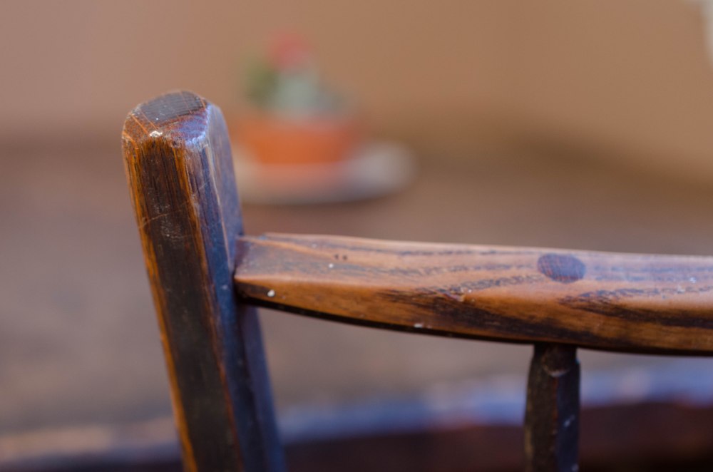 A weathered chair and table, passed on to me from my childhood home.