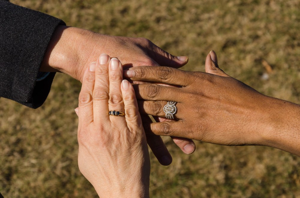 Diverse hands, reaching out with compassion