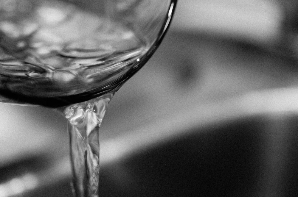 Water begin poured into a sink