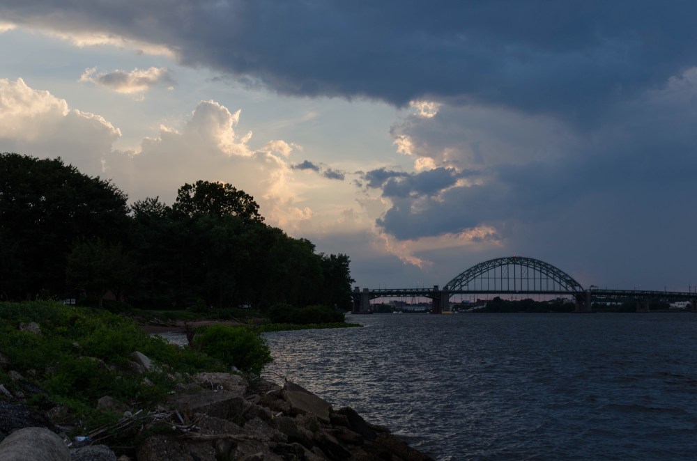light and  dark clouds compete in the sky