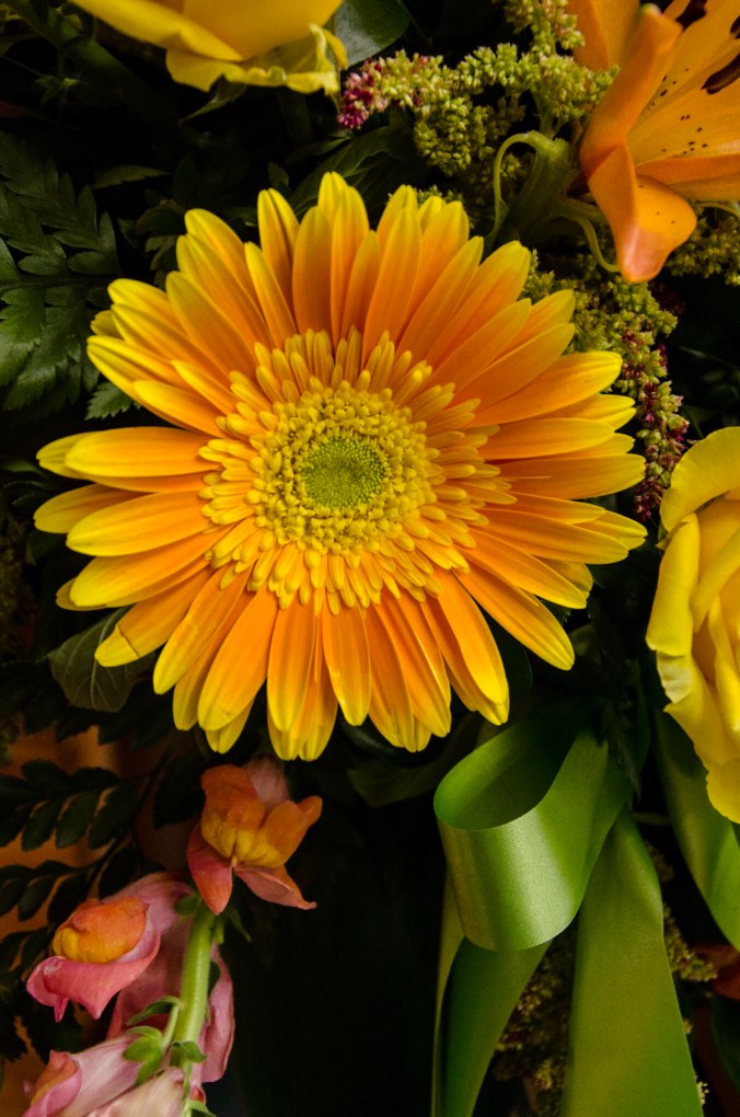 fall flowers in a funeral arrangement