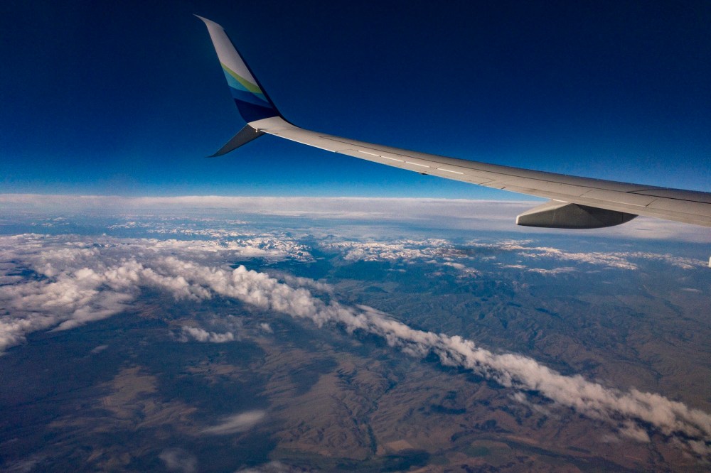 Airplane Wing, high above the clouds