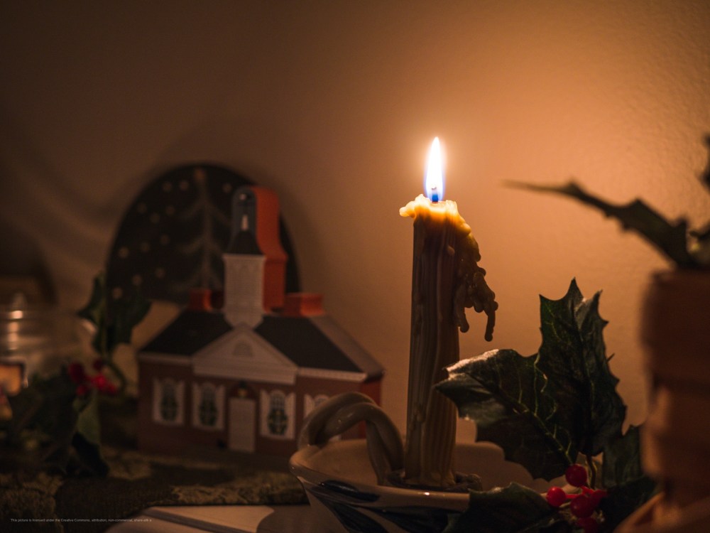 A bayberry candle burns in the new year.