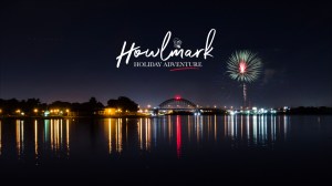 Howlmark logo over the Tacony-Palmyra Bridge. A firework explodes in the night.